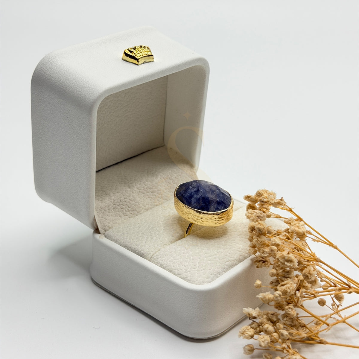 Natural blue sapphire Neelam ring in a Sakinah presentation box, side view