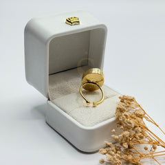 Natural blue sapphire Neelam ring showing the adjustable gold plated band
