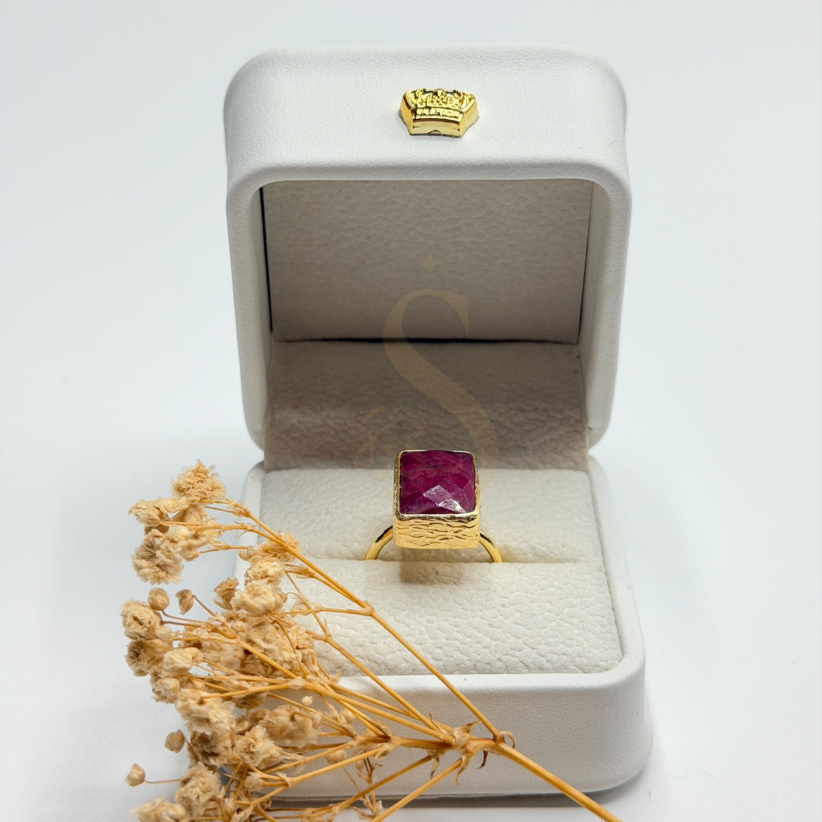 Natural ruby statement ring in a Sakinah presentation box, front view
