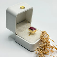 Natural ruby statement ring in a Sakinah presentation box, side view
