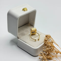 Natural ruby statement ring showing the adjustable gold plated band