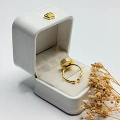 Red ruby Surkh Yaqoot natural stone ring showing the adjustable gold plated band