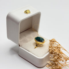 Natural green cat’s eye gold plated adjustable ring, angled view