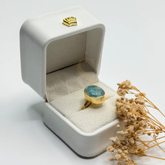 Natural aquamarine gold plated adjustable ring, angled view