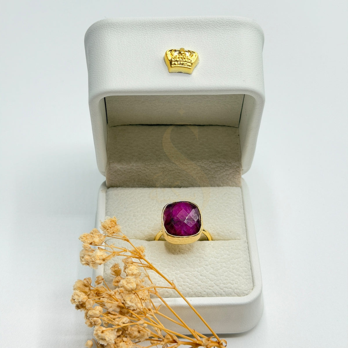 Natural Purplish Red Ruby gold plated statement ring in a Sakinah presentation box, front view