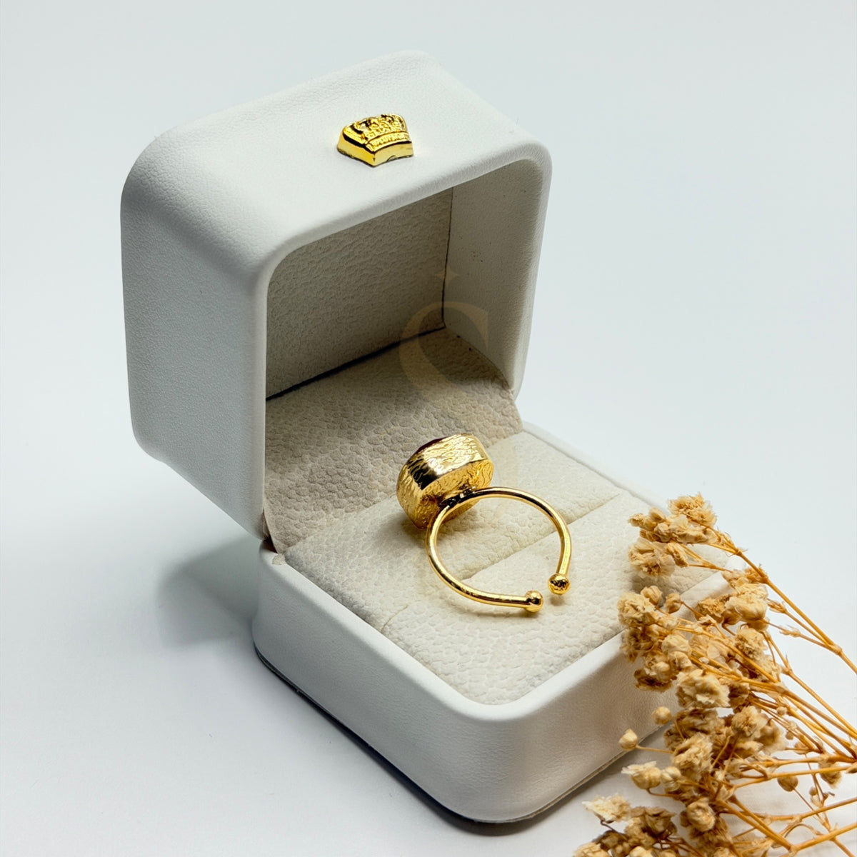 Natural Purplish Red Ruby statement ring showing the adjustable gold plated band