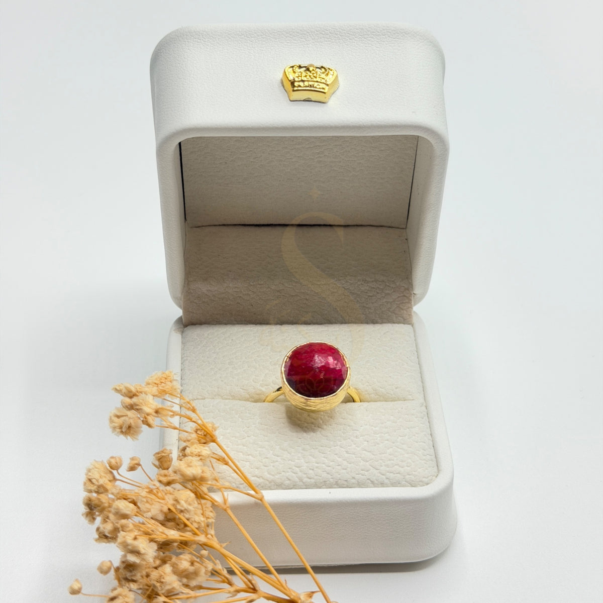 Round Natural Ruby statement ring in a Sakinah presentation box, front view