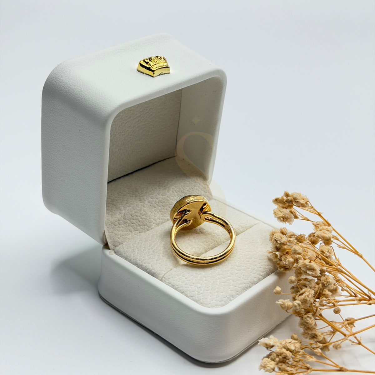 Faceted Black Onyx ring showing the adjustable gold plated band