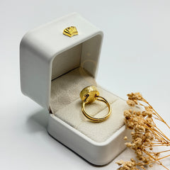 Rainbow Moonstone statement ring showing the gold plated band