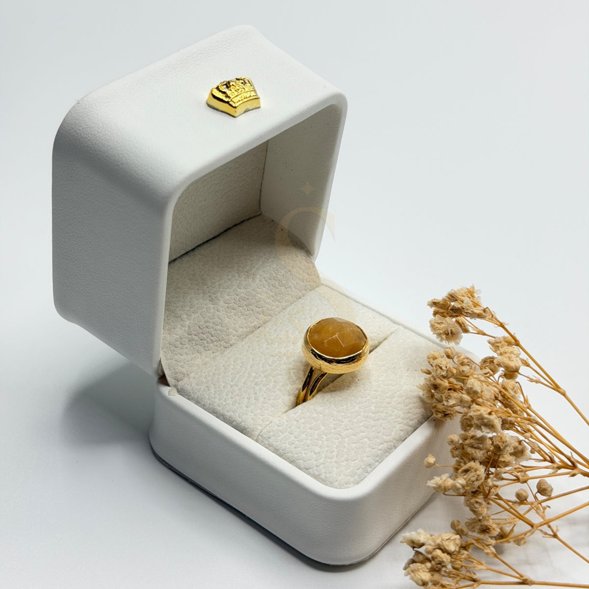 Honey Calcite natural stone ring in a Sakinah presentation box, angled view