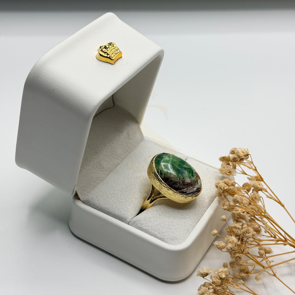 Green Onyx Calcite statement ring in a Sakinah presentation box, angled view