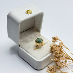 Green Banded Calcite natural stone ring in a Sakinah presentation box, angled view