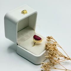 Half Moon Natural Ruby statement ring in a Sakinah presentation box, angled view