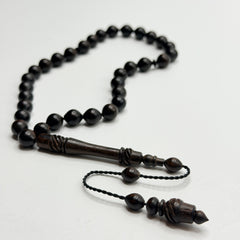 Handmade ebony 33 bead Tasbih on a white background