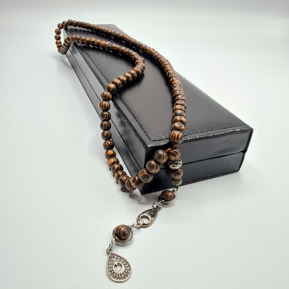 Full length Kafur camphor wood 99 bead Tasbih showing handmade detailing