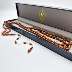 Handmade Kuka wood 99 bead Tasbih presented in a large luxury leather gift box