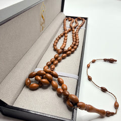Close view of lightweight handmade Kuka wood beads and polished finish