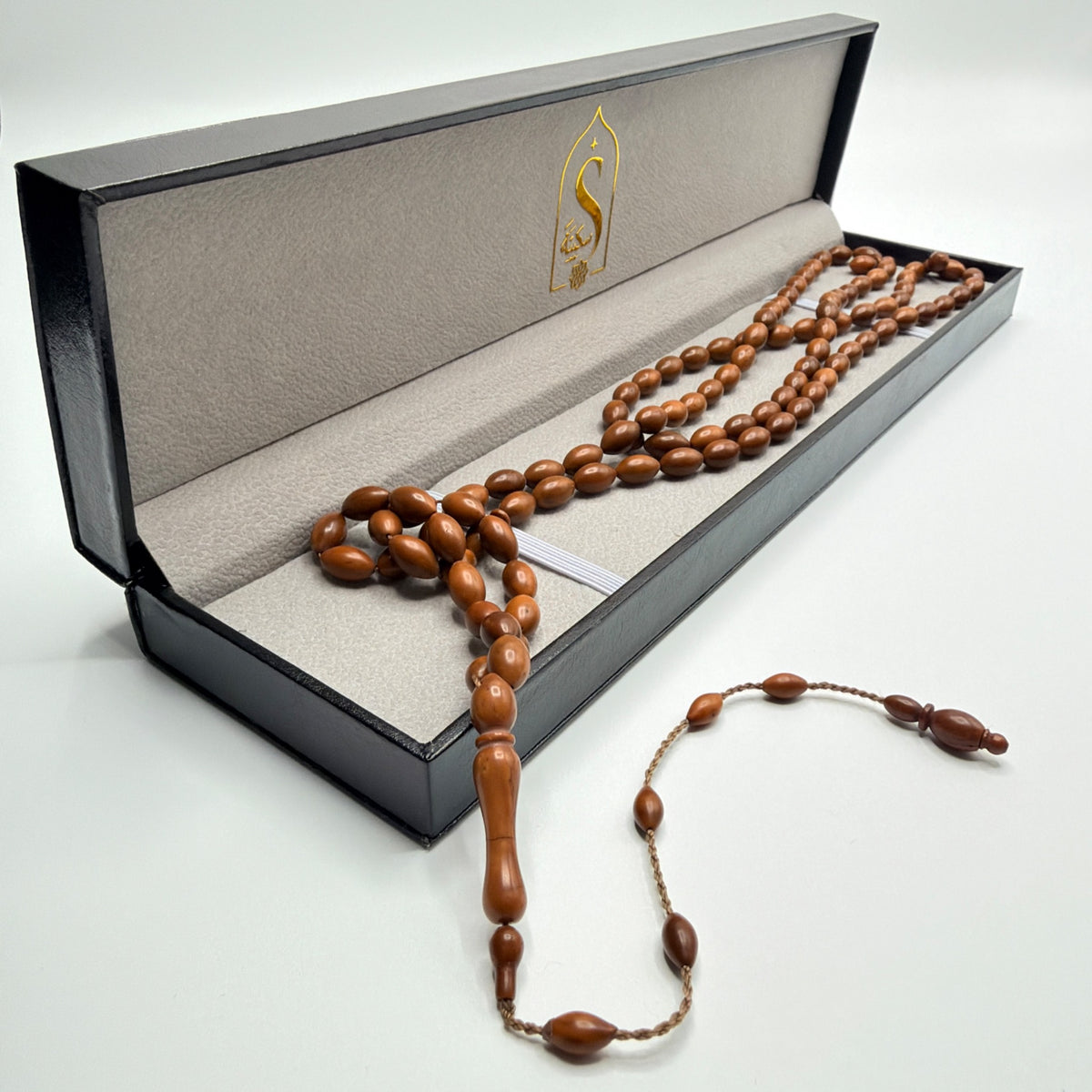Handmade Kuka wood 99 bead Tasbih arranged in the Sakinah luxury leather gift box