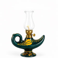 Wisdom Lamp in deep green with gold floral decoration and a clear glass chimney