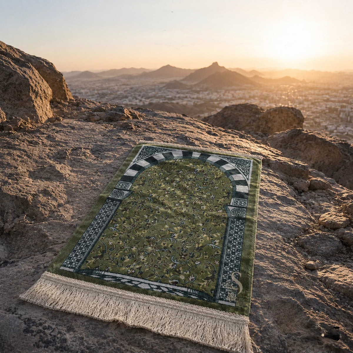 Rawda Travel Prayer Mat displayed outdoors at sunset