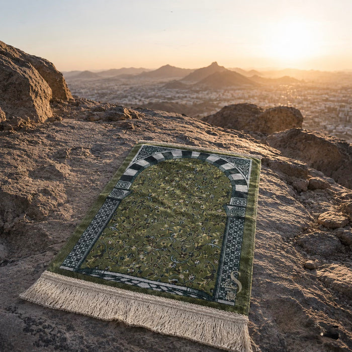 Rawda Travel Prayer Mat displayed outdoors at sunset