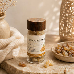 Pure frankincense resin jar styled with natural resin tears in warm light