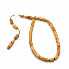 Genuine olive wood Tasbih on a clean white background