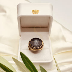 Large black aqeeq brass ring with Nalain Mubarak motif in a Sakinah presentation box