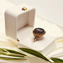 Side view of the ornate antique finish on the black aqeeq Nalain ring