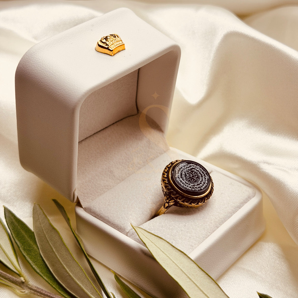 Side view of the medium black aqeeq ring and ornate antique gold tone setting