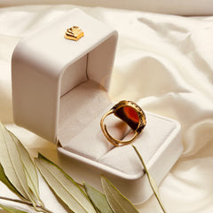 Back view of the red aqeeq ring with an adjustable handmade brass band