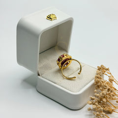 Rear view of the Natural Pink Agate ring showing its adjustable gold plated band